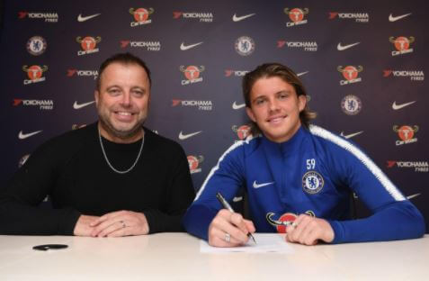Conor Gallagher with his dad while signing a contract with Chelsea in October 2018.